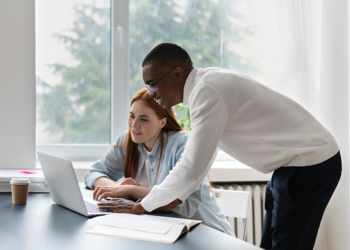Modern office workspace with financial analysis tools and technology
