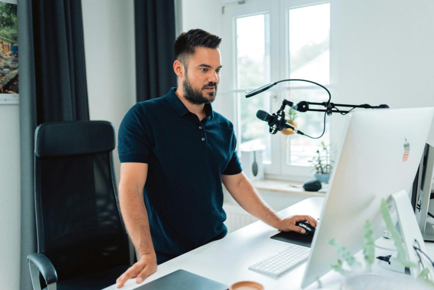 Student working on financial software on laptop
